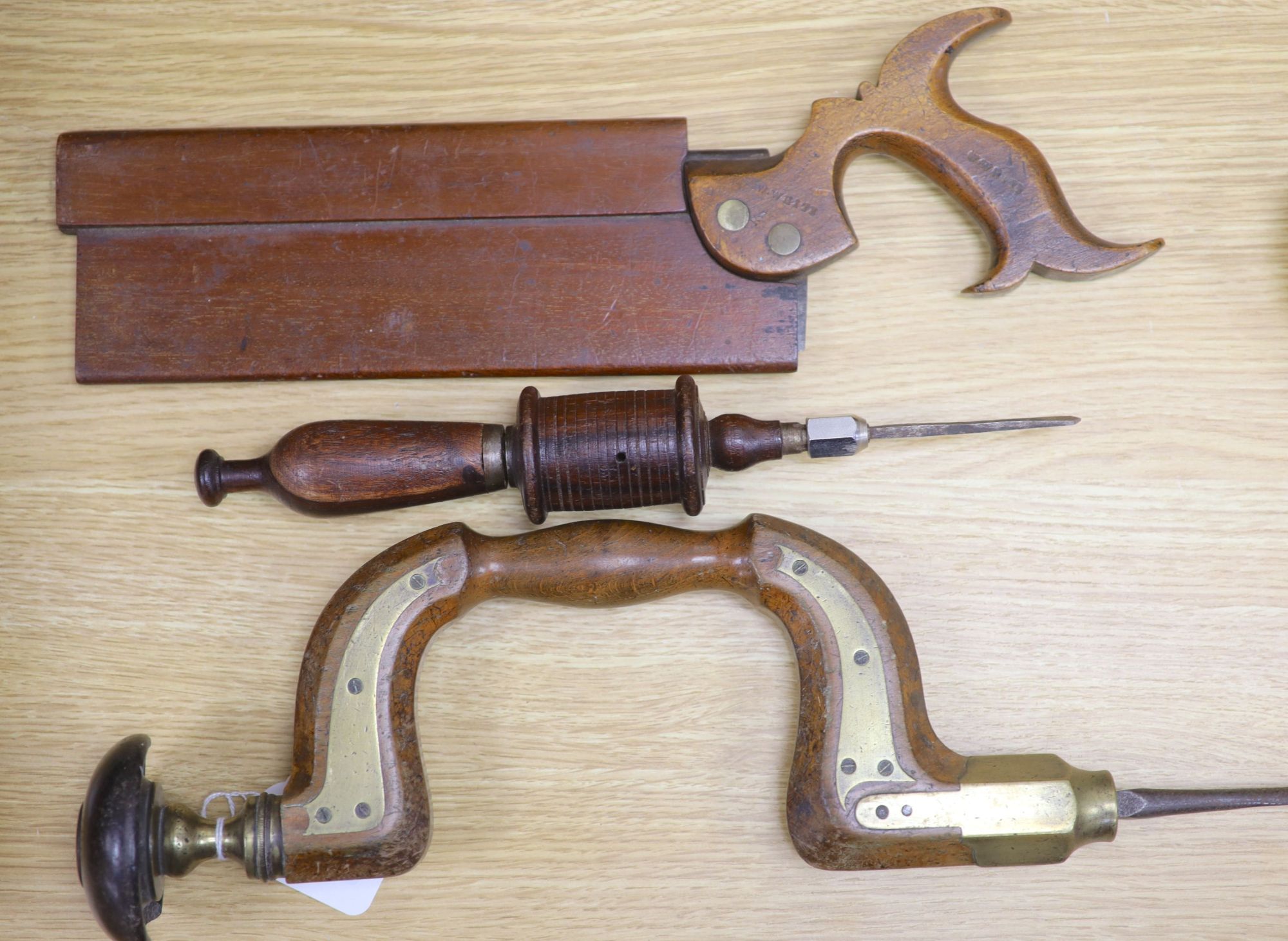 A Victorian beechwood brace, a Victorian tenon saw and one other tool (3)